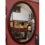 An oval mirror.