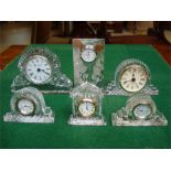 A Waterford crystal mantle clock together with a G