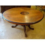 A 19th Century walnut loo table.