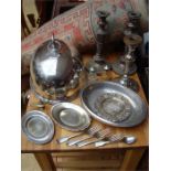 A quantity of silver plate and metal plate to include candlesticks, flatware etc.