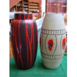 Two West German art pottery vases, one with red decoration on a brown ground, 39cm high, the other