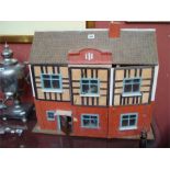 A Ca. 1950's dolls house and furniture.