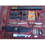 A mixed lot to include a Bowie knife, two hunting knives, several small folding pocket knives, two