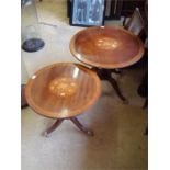 Two pedestal tables with marquetry inlay.