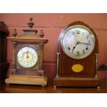 A cased mantle clock (scratches to front) together