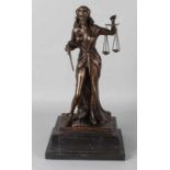 Bronze figure in black marble base, 21st Century. Parody 'Lady Justice' (net stockings and broken