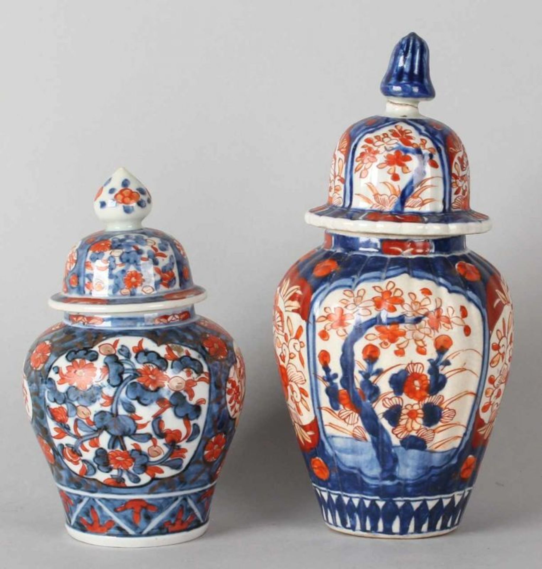 Two pieces of 19th century Imari porcelain covered vases with floral decorations. One dekseltop