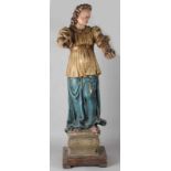 Large south German baroque carved figure with original polychrome woman with grapes in hand. Left