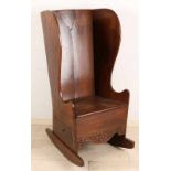 Ancient English oak rocking chair with very large ears and drawer. 18th-19th century. Dimensions: