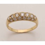 Gold ring, 585/000, pavé set with brilliants. Width 5.5 mm approx. 3.4 gr. Island 62