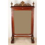 Rare antique mahogany tile mirror with woodcut ornaments and loads underlying lions. Approx. 1800.