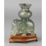 Antique jade Indian elephant with vase on wooden console (one chip). Around: 1900, China. Size: 14.