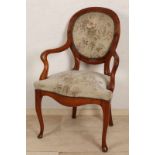 Mahonie Biedermeier armrest chair. 19th century. Fitting bit bald, further in good condition.