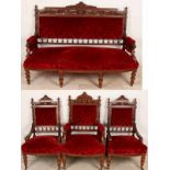 Antique (German) wooden bench with three chairs on wheels. About 1880. Historism. (Red velours