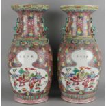 Two large-labeled Chinese porcelain ornamental fries. Second half 20th century. Vases feature