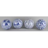 Four old Chinese porcelain balls with floral decors. 20th century. Size: approx. 17 cm. In good