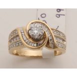 Ornate yellow gold ring, 585/000, generously occupied with diamonds. A ring with a brilliant cut