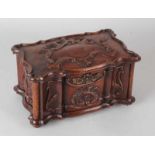 Oak-stitched Rococco / Baroque-style casket with division. 19th century. Coffin is fitted with