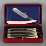 Antique ivory shaving set with seven razor blades in cassette. 'Christopher Johnson Sheffield'.