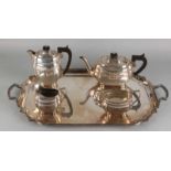 Beautiful English silver coffeeware, 925/000, 4-piece, placed on a plated tablet. A crockery with a