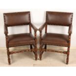 Six Dutch oak leather armchairs with brown leather lined. First half 20th century. Dimensions: 88 x