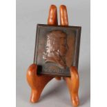 Ancient bronze plaque with Mozart. Signed: Text. (Edouard Text, 1872-1948). Dimensions: 5.5x6x0.5