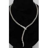 Beautiful white gold choker, 750/000, with many brilliants. Choker made of cylindrical links, ø 4,3