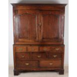 English Georgian 18th century oak cabinet with five drawers and four blind drawers with bronze