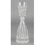 Cut crystal carafe with vertical ribs and ground star on the bottom. With a slit stop which is also