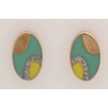 Oval ear studs, 416/000, decorated with diamonds and green and yellow enamel. About 2 grams.