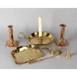 Six parts antique brass. Two candlesticks, one large blaker, one dust bag, one vial and one candle