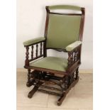 Ancient English mahogany rocking chair with iron swing springs and good velours upholstery. About: