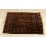 Old Persian towel, in red-brown. Dimensions: 124 x 82 cm. In good condition.