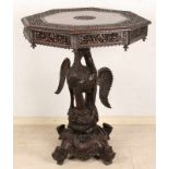 Rare oriental woodcut ornamental table with dragon, foohound, big bird, cups et cetera. Octagonally