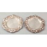 Two silver plates, 830/000, Sweden. Stretched round silver plates with contoured border. In