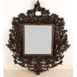 Beautiful large antique walnut stowed mirror. 19th Century, with roccaille, rocks with flowers.