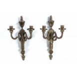 Two antique Louis Seize-style bronze wall hangers. Approx. 1900. Dimension: 40 cm.In good