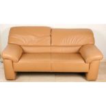 Brown leather two-seater sofa. Dimensions: 80 x 185 x 95 cm. Backrest headrests height adjustable.