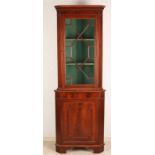 English mahogany corner-wardrobe closet. Second half 20th century. Two-door style furniture.