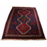 Old Persian garment, dark blue / black / red / cream-floral decors. Dimensions: 150 x 245 cm. In