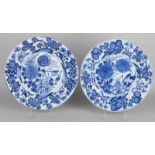 Two large 17th-18th century Chinese porcelain dishes with floral decors. Marked with sheet. One