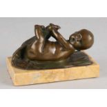 Antique bronze baby on marble basement. About 1920. Dimensions: 8 x 14 x 7,5 cm. In good condition.