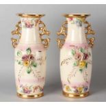 Two antique French ceramics decorated with fancy rose and gold decor. 'Case 974'. Size: 29 cm.In