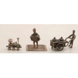 Three silver miniatures, 835/000, consisting of a small locomotive, 2.5x1x2cm, icecream ice cream