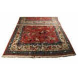 Old Persian dress with figures decors. In the colors red / blue / cream. Dimensions: 217 x 343 cm.