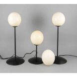 Three separate design lamps made of ostrich eggs. Second half 20th century. Size: 33-52 cm.In good