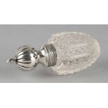 Antique crystal pepper box with vertical grooves and diamond and crosspiece with silver frame and