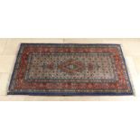 Old Persian runner. Nice hand knot, in the colors blue / red / cream etc. Decor Moed, Iran.