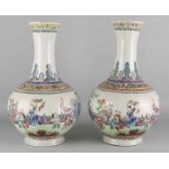 Two antique Chinese porcelain bolvazen ​​with playing figures in garden decors. Marked. Dimension: