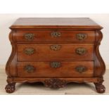 Ancient Dutch mahogany bellycommode with bronze batter and claw legs. About 1800. Dimension: 70 x